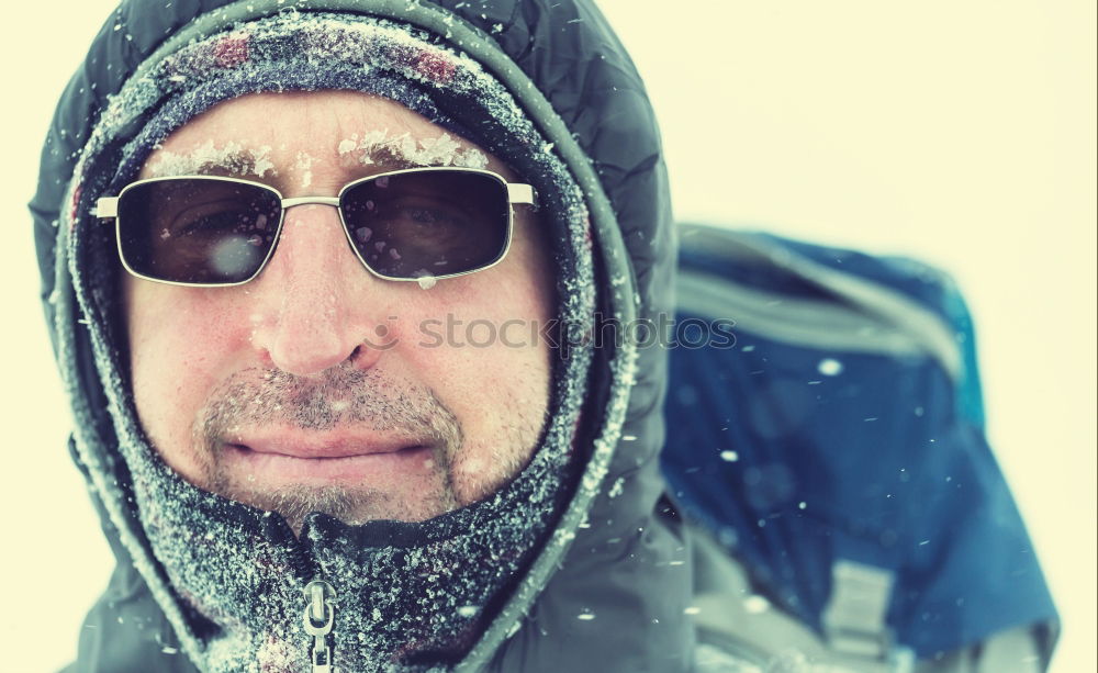 Similar – Happy man with a mustache in a knitted winter cap and warm winter clothing