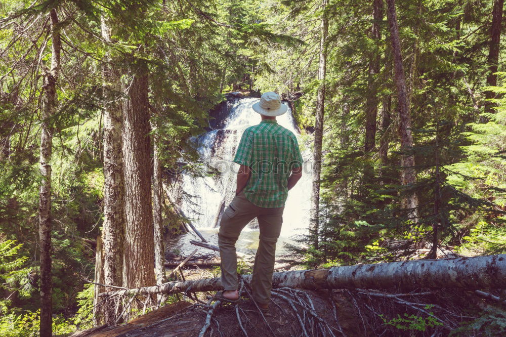 Similar – Image, Stock Photo Boy packing his clothes to backpack on trail