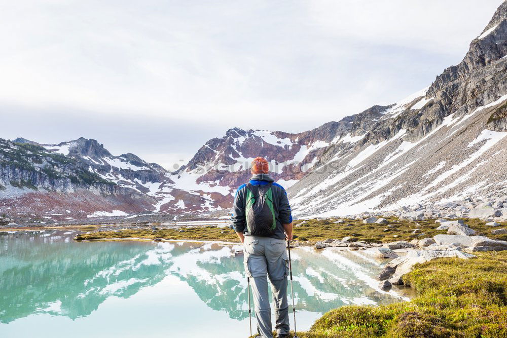 Similar – Man posing in mountains