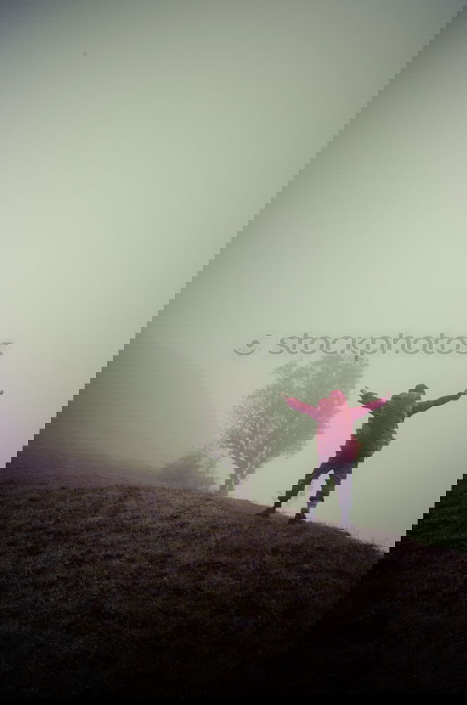 Similar – Image, Stock Photo Portrait of a woman hiking with fog