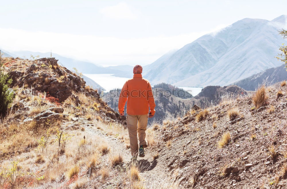 Similar – Image, Stock Photo Young woman hiking, Timmelsjoch E5.