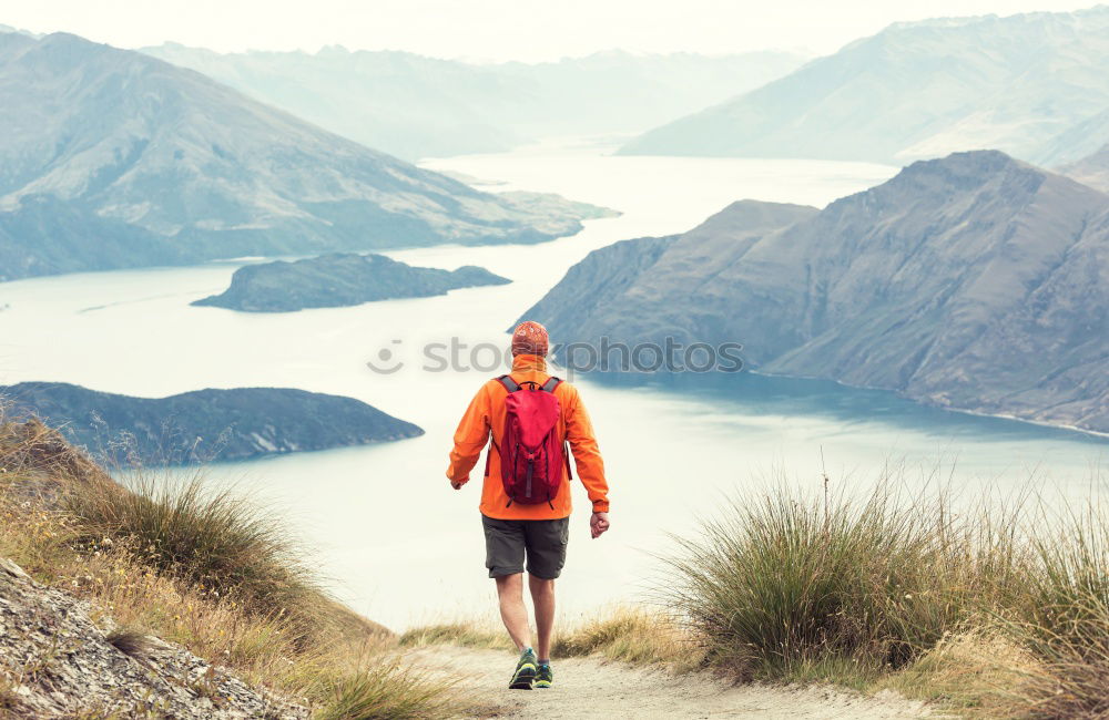 Similar – Young Backpacker enjoying of Nature.