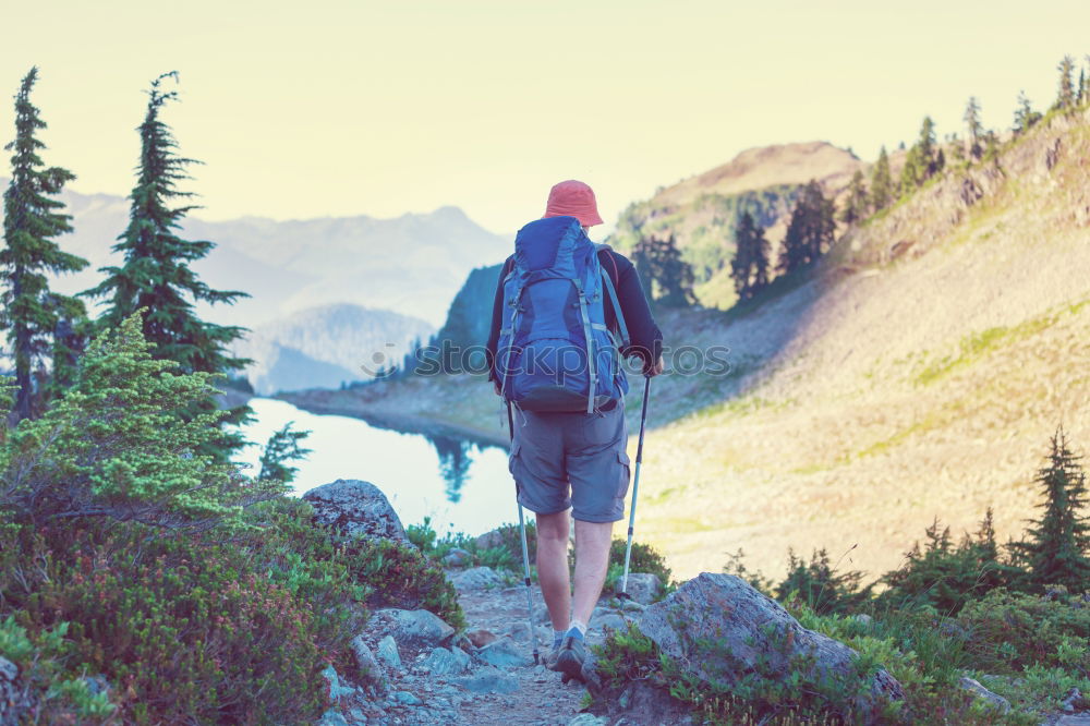 Similar – Young woman crossing the Alps