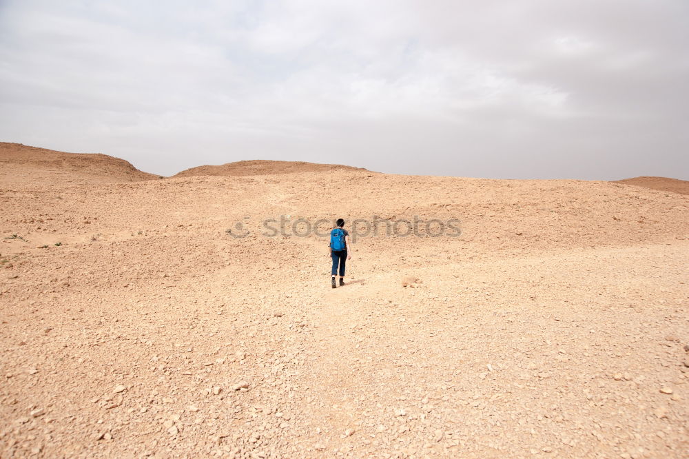 Similar – Cameraman in Desert