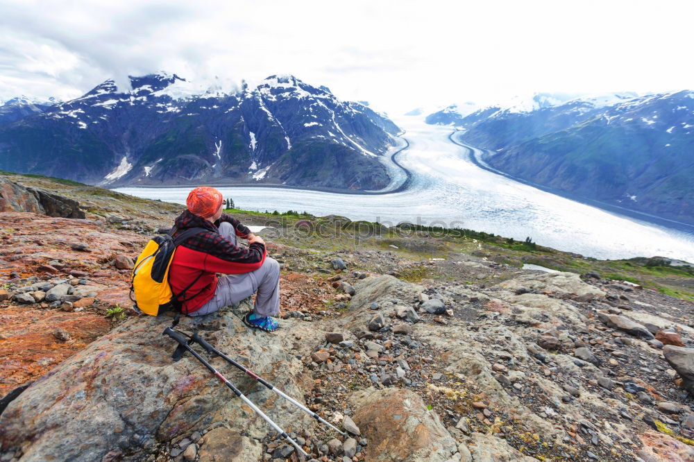 Similar – Image, Stock Photo Two hiking backpacks in front of an evening mountain panorama