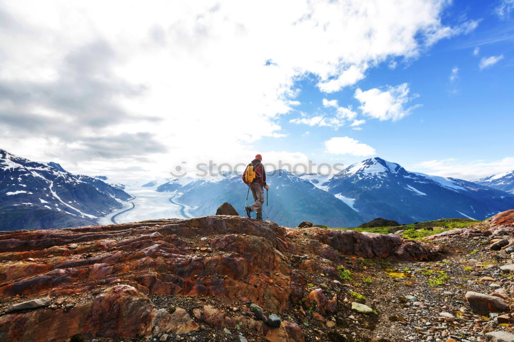 Similar – Image, Stock Photo Two hiking backpacks in front of an evening mountain panorama