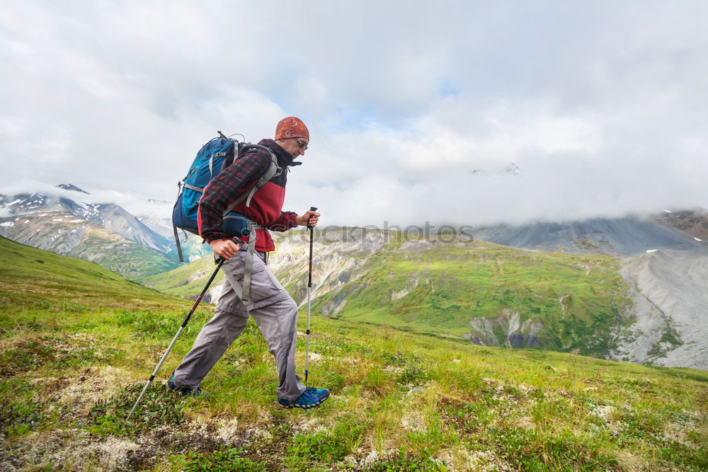 Similar – Foto Bild Frau mit Rucksack und Wanderstöcke