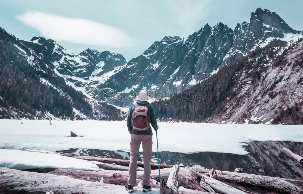 Similar – Women at lake in mountains