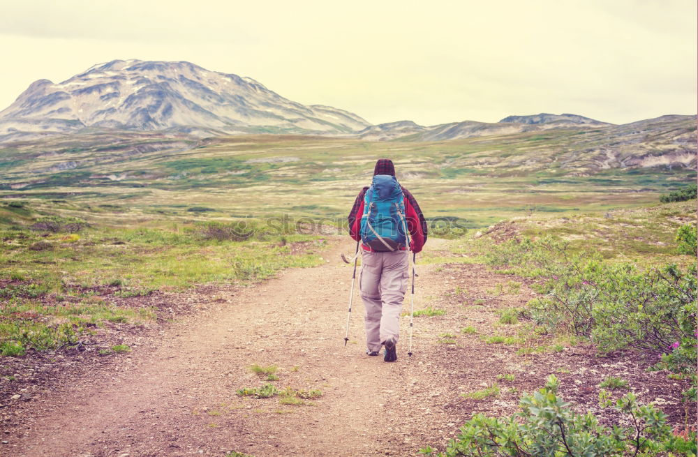 Similar – Young woman crossing the Alps