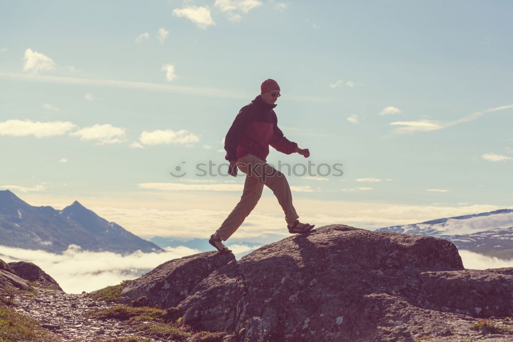 Similar – Boy hiking among the dwarf pine