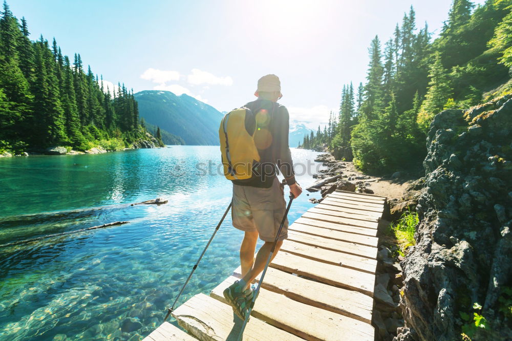 Similar – Woman refreshes herself while hiking