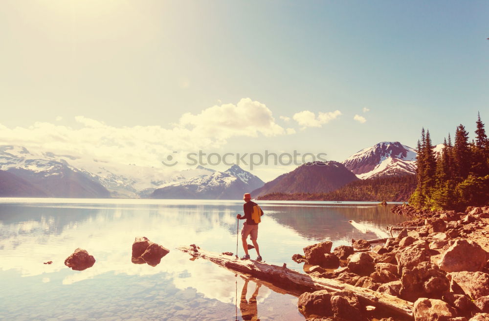 Similar – Image, Stock Photo Girl sitting on a deck over a lake