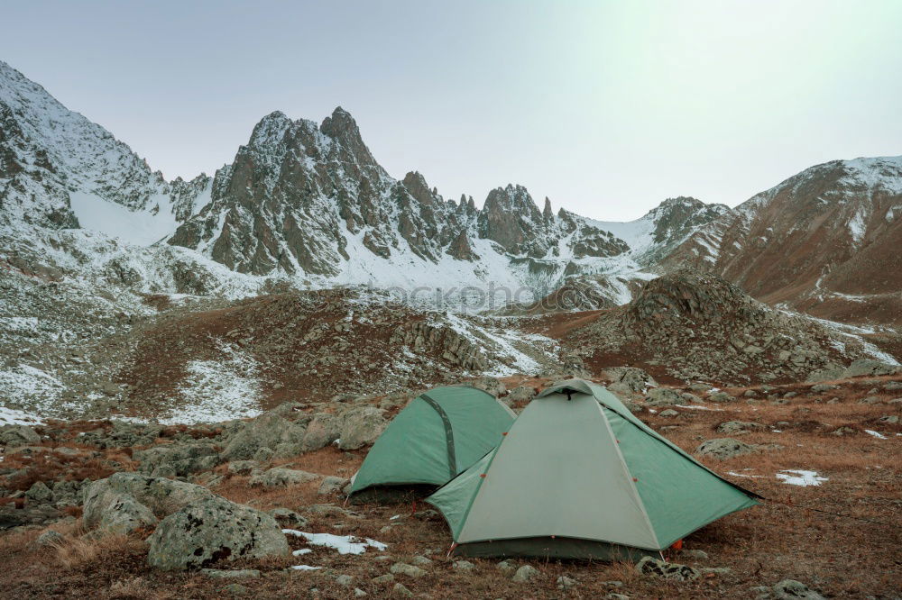 Similar – Image, Stock Photo Green tent on the green lawn in snow mountains