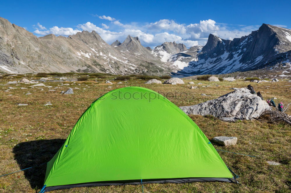 Similar – Image, Stock Photo Green tent on the green lawn in snow mountains