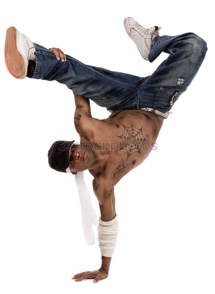 Similar – Fit shirtless young black man doing legs stretching