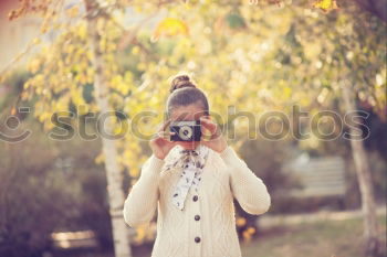 Image, Stock Photo Smiling girl with camera in the field