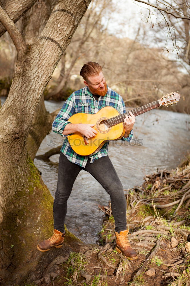 Similar – Image, Stock Photo outdoor photo session with a bass player and his instruments