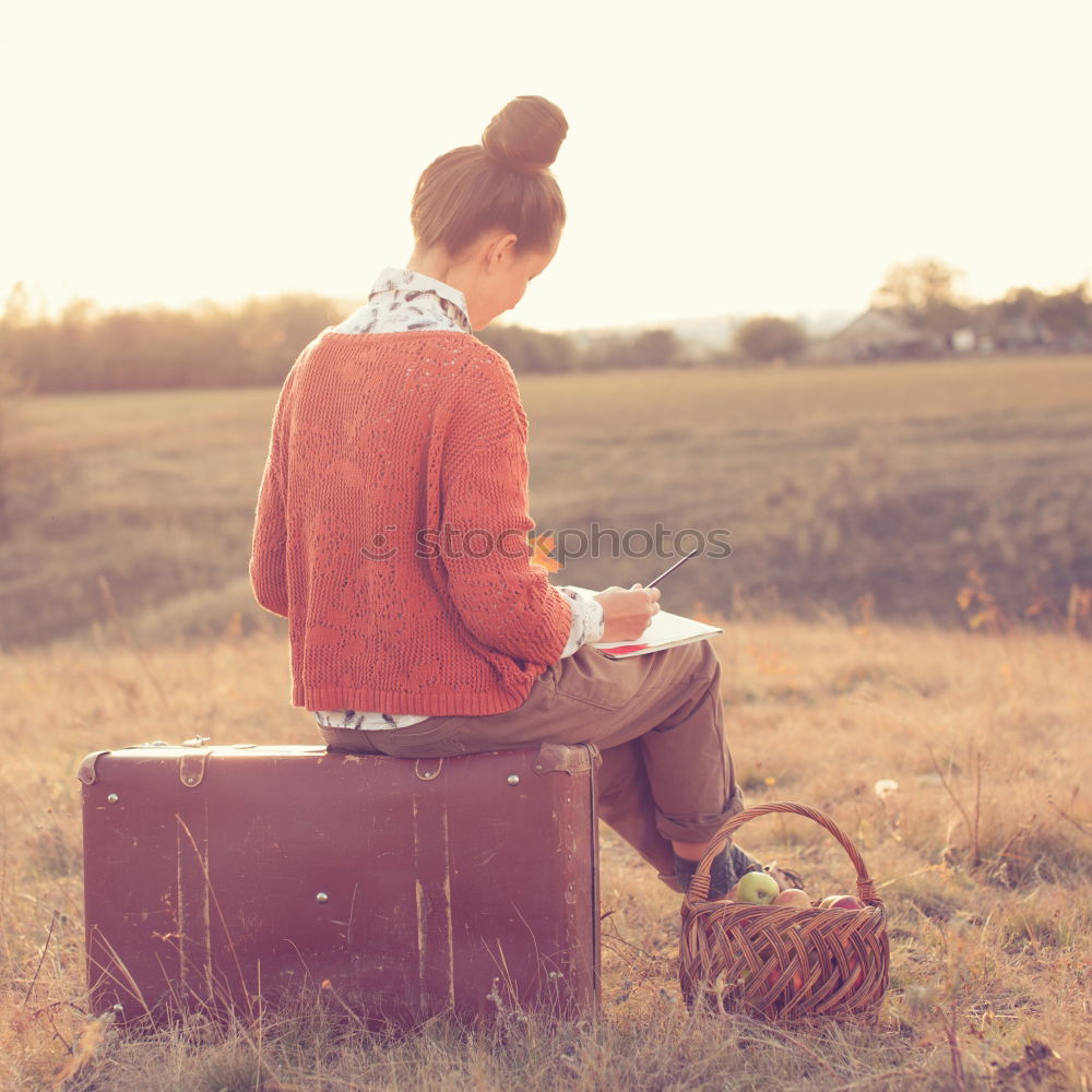 Similar – Image, Stock Photo Young hiking woman taking notes in the nature