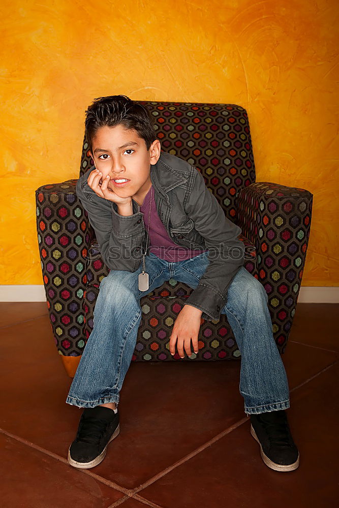 Similar – Cheerful child standing with his backpack on the floor