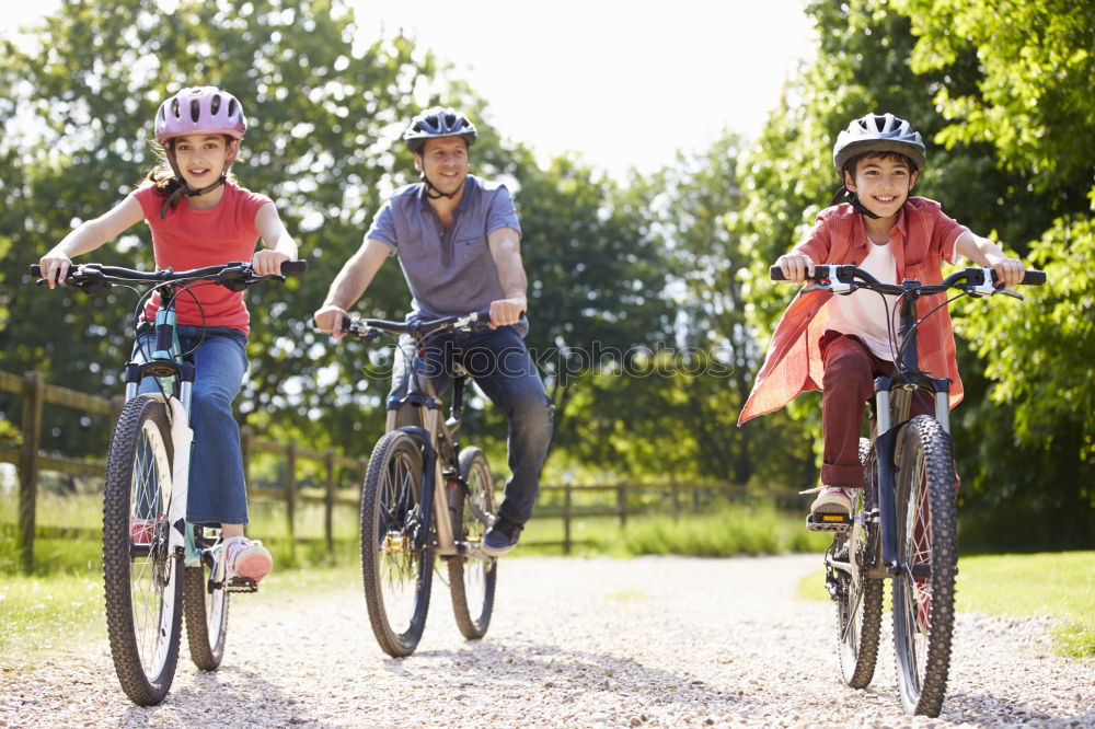 Similar – Image, Stock Photo women using smartphone on bicycles