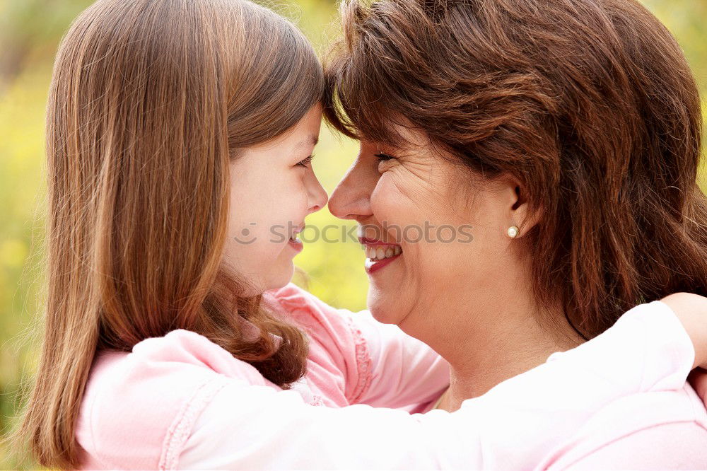 Similar – Image, Stock Photo Mother and son seated on a park