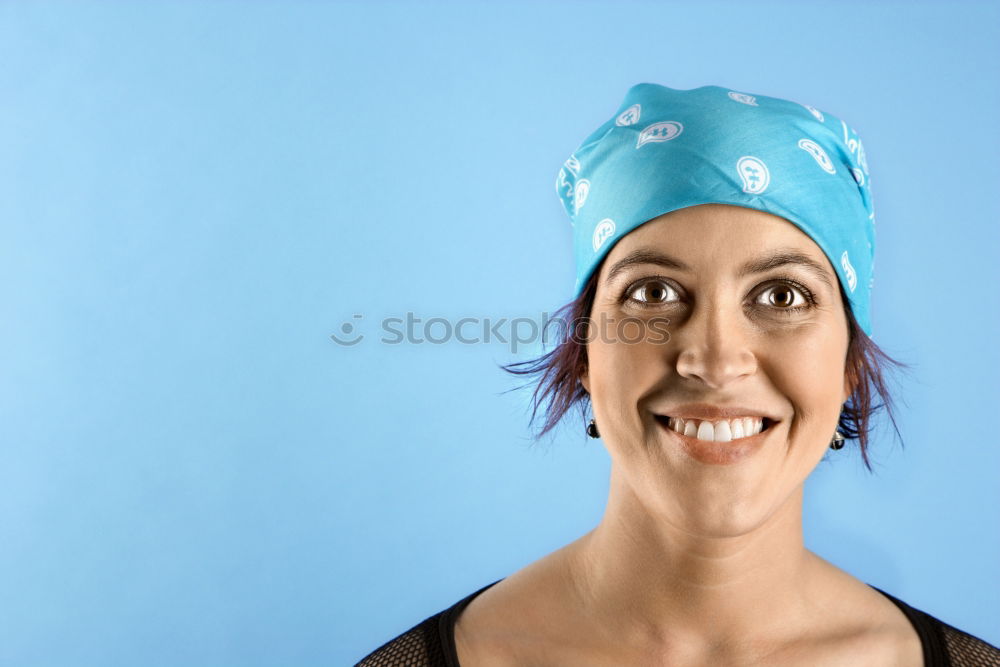 Similar – Image, Stock Photo Female therapist in white robe tying bandana of medical uniform