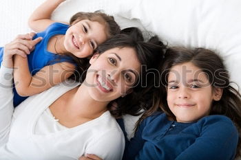 Similar – Image, Stock Photo Mother and daughter smiling and hugging outdoors