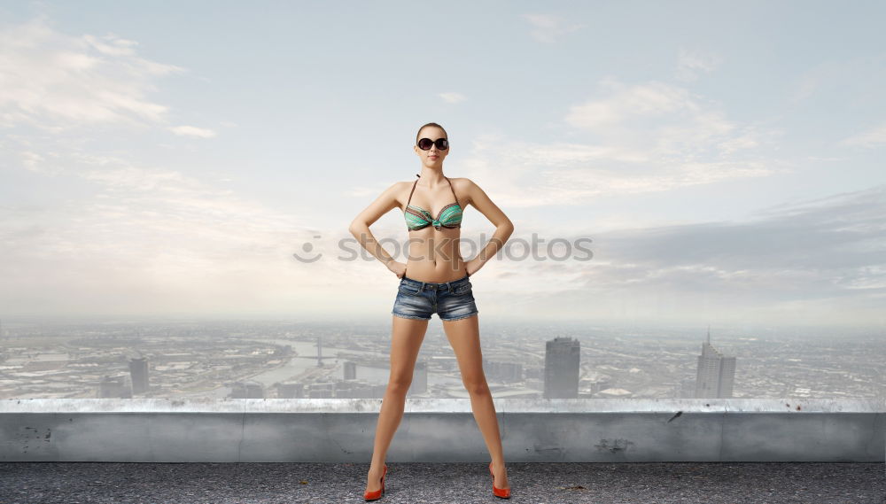 female runner jumping for joy