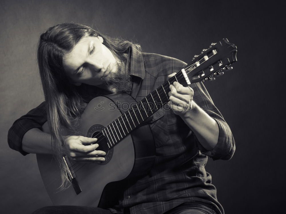 Similar – Image, Stock Photo Man playing guitar in nature