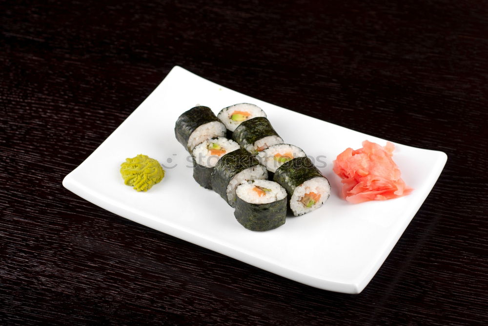 Similar – Japanese food: maki and nigiri sushi set on black background.