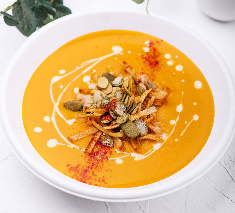 Similar – Image, Stock Photo Pumpkin soup on the plate