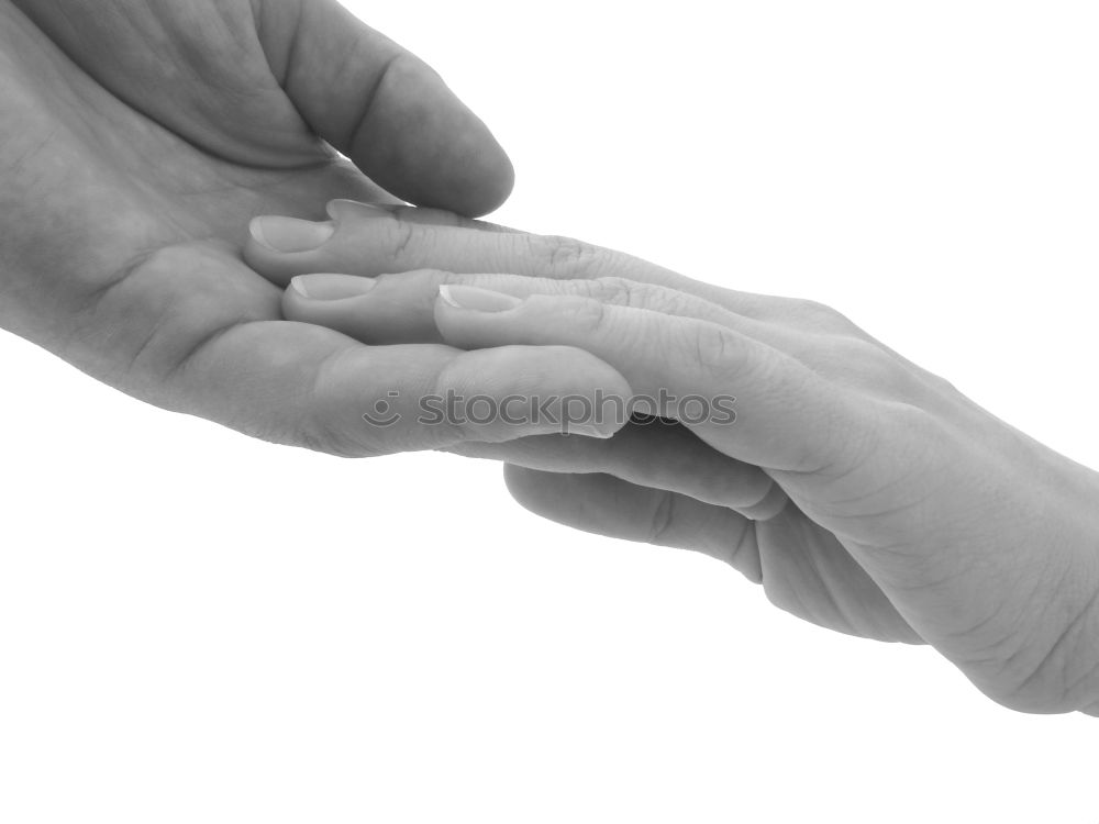 Similar – Mothers hands holding premature babies feet