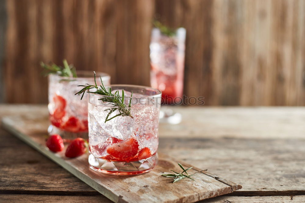 Similar – Image, Stock Photo Watermelon with rosemary and ice cream sticks as a refreshing drink on a silver tray