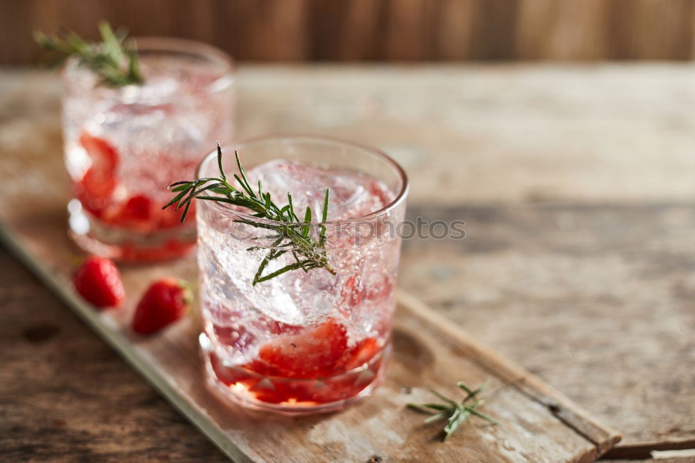 Similar – Image, Stock Photo Watermelon with rosemary and ice cream sticks as a refreshing drink on a silver tray