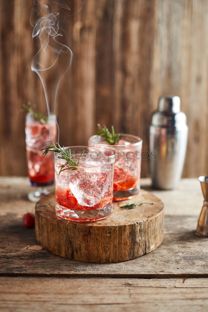 Similar – Image, Stock Photo Watermelon with rosemary and ice cream sticks as a refreshing drink on a silver tray