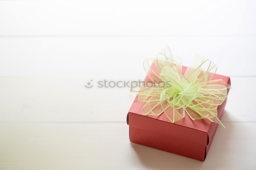 Similar – Image, Stock Photo Gift box, wrapped in recycled paper and red bow