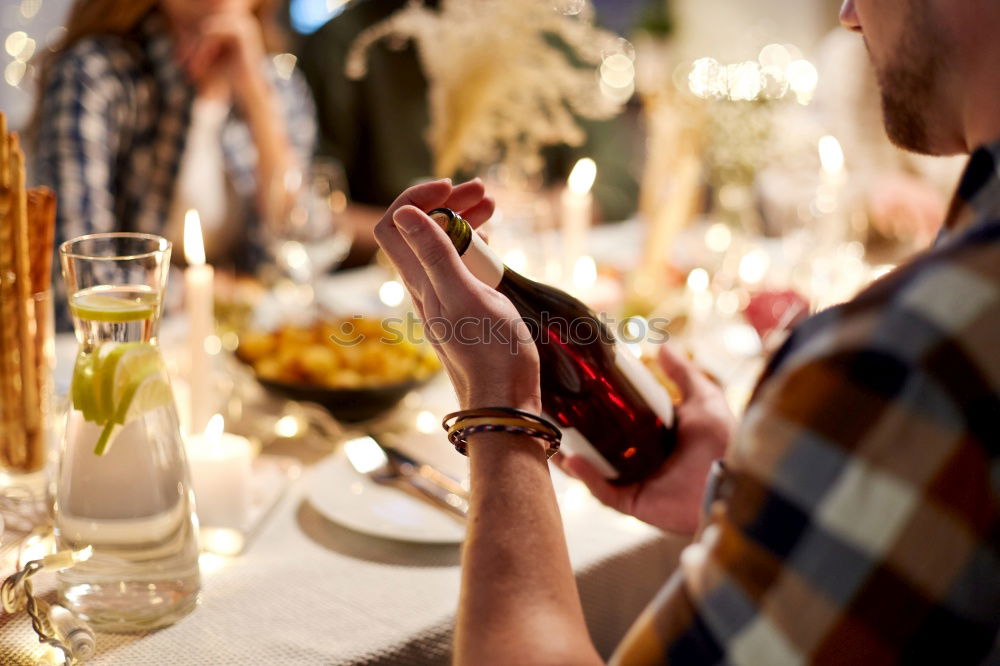 Similar – Group of People enjoying food and wine at restaurant