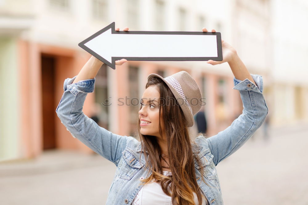 Similar – Dreaming girl looking away in window