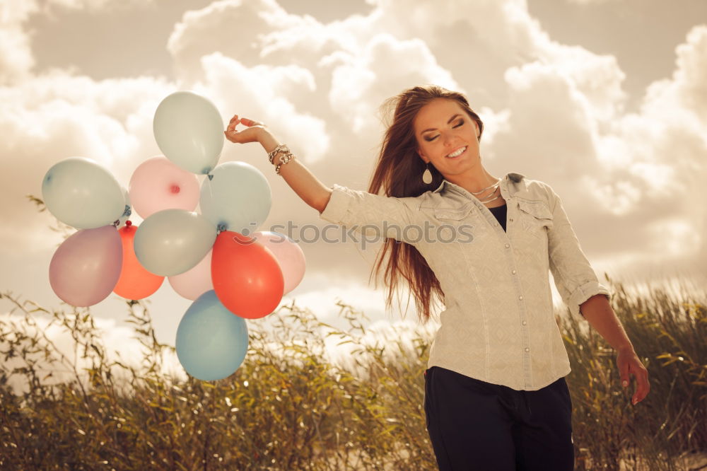 Similar – beauty girl with a cotton candy in a fair