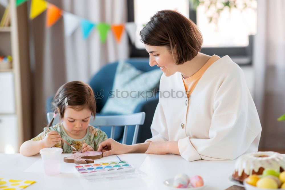 Similar – Image, Stock Photo Woman assembling furniture at home with Daughter