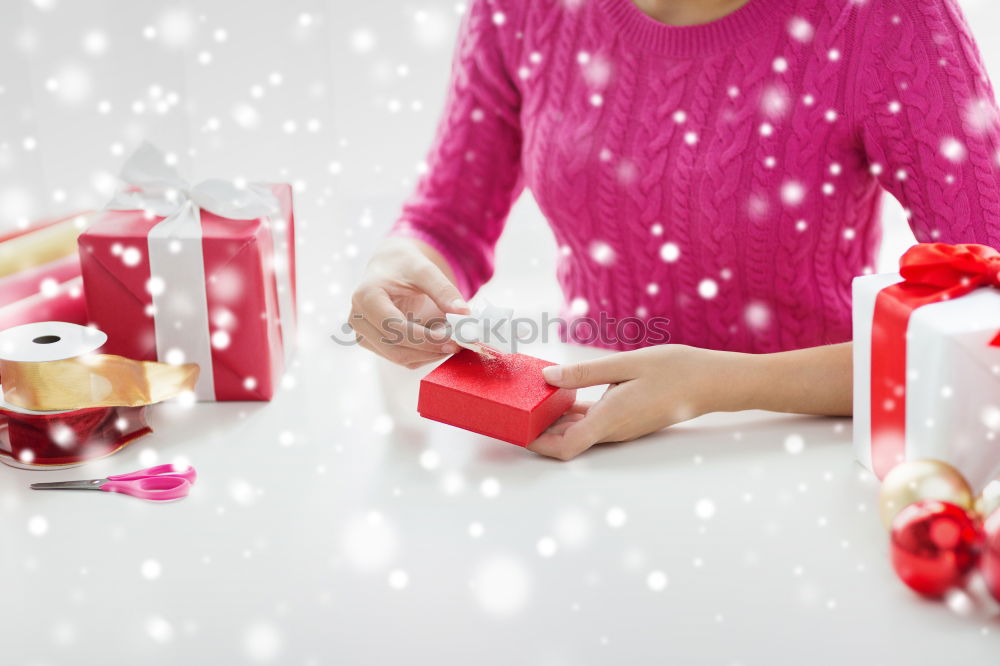 Similar – Young man holding a christmas gift