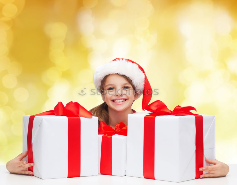 Similar – Adorable kid with Santa´s hat on Christmas day.