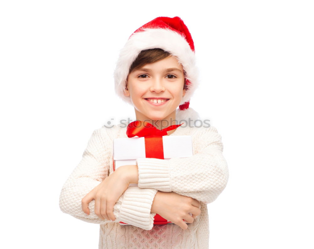 Image, Stock Photo Adorable kid with Santa´s hat on Christmas day.