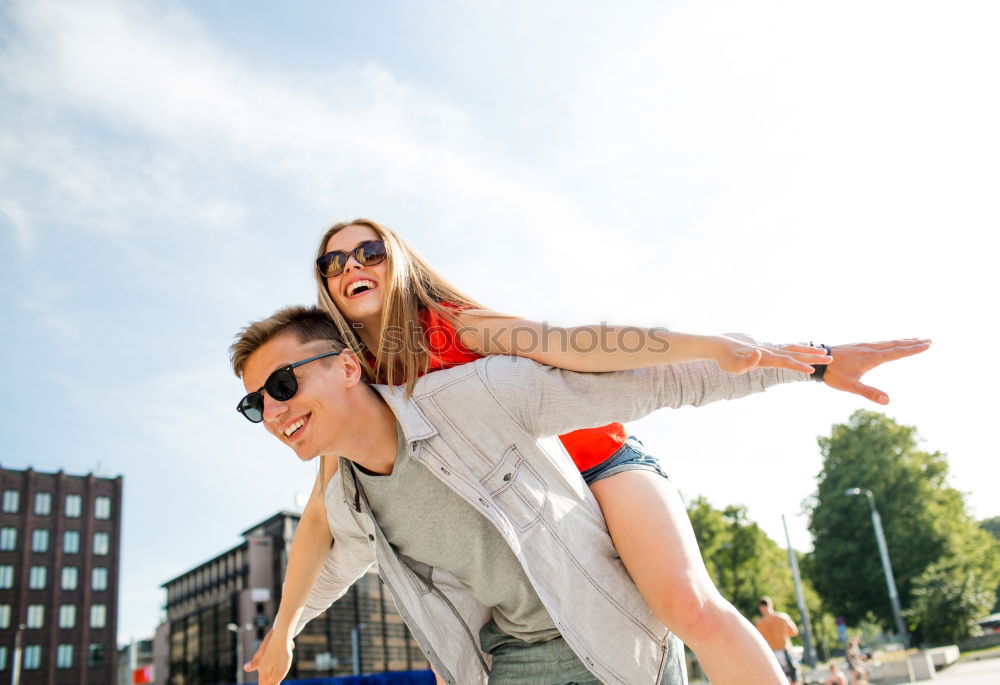 Similar – Happy friends sitting on steps