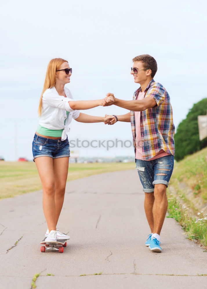 Similar – Romantic Young Couple Walking in the City.