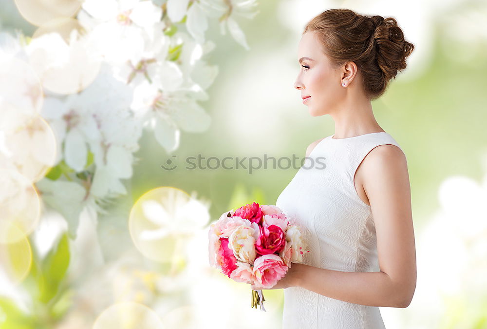 Similar – Young woman smelling almond flowers in springtime