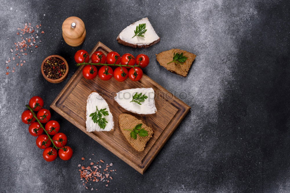 Similar – Fresh tomatoes on wooden table