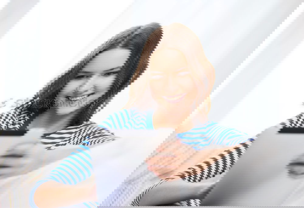 Similar – Image, Stock Photo Overhead photograph of two beautiful young women at home sitting on sofa while using a tablet PC computer and smiling