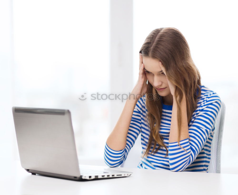 Similar – Image, Stock Photo Young desperate student with glasses looks over a laptop