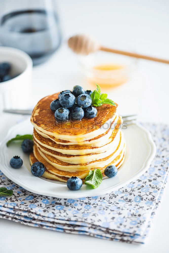 Similar – Image, Stock Photo Pancakes with raspberries and blueberries on white